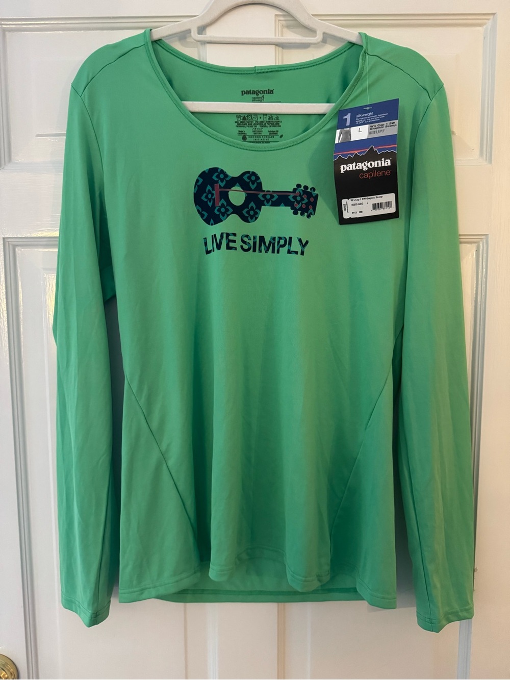 Patagonia Women’s Long-Sleeve 'Live Simply' Top — Mint Green with Navy Graphic